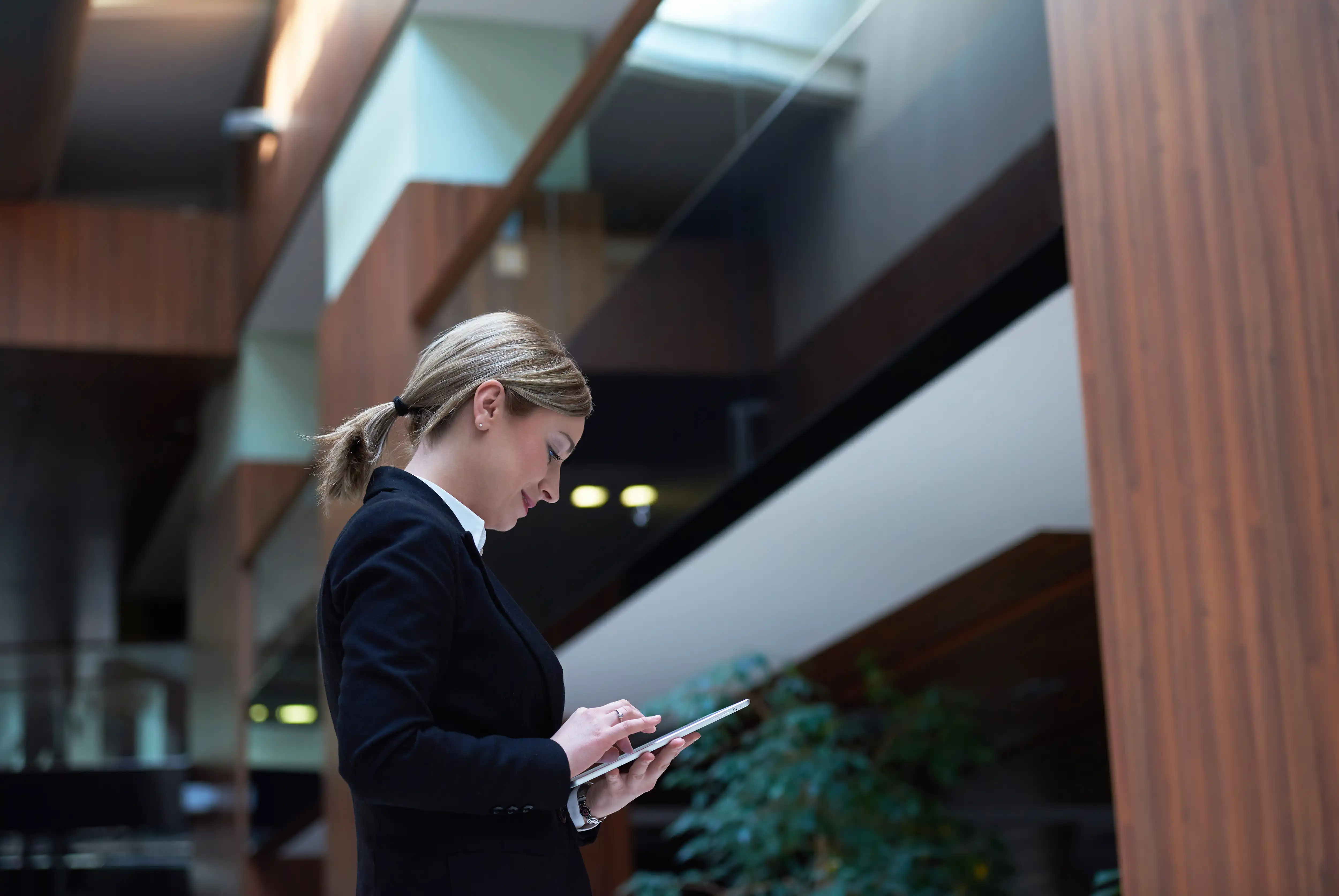 Woman making a booking, technology helps us simplify processes