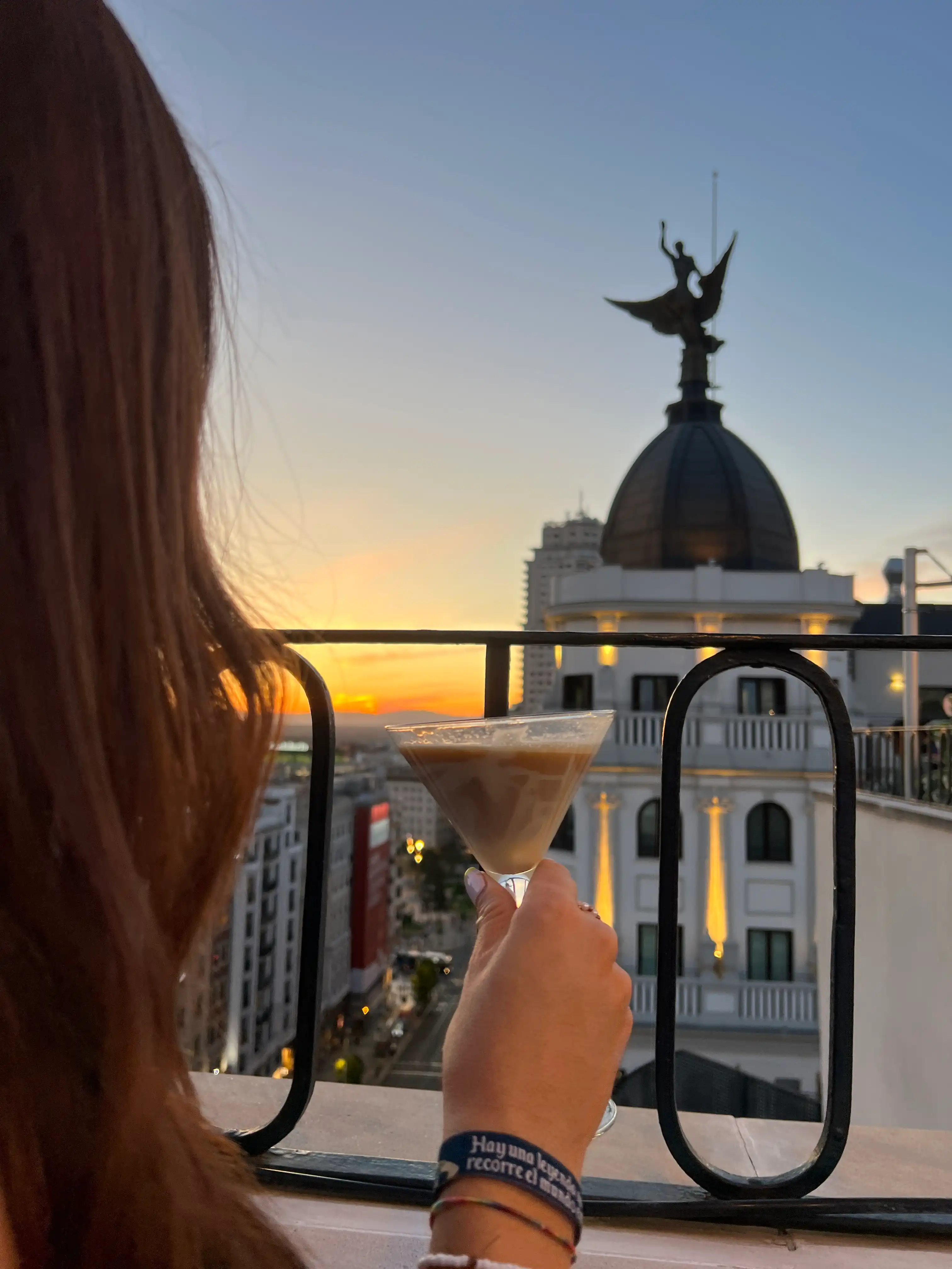 Woman holding a cocktail