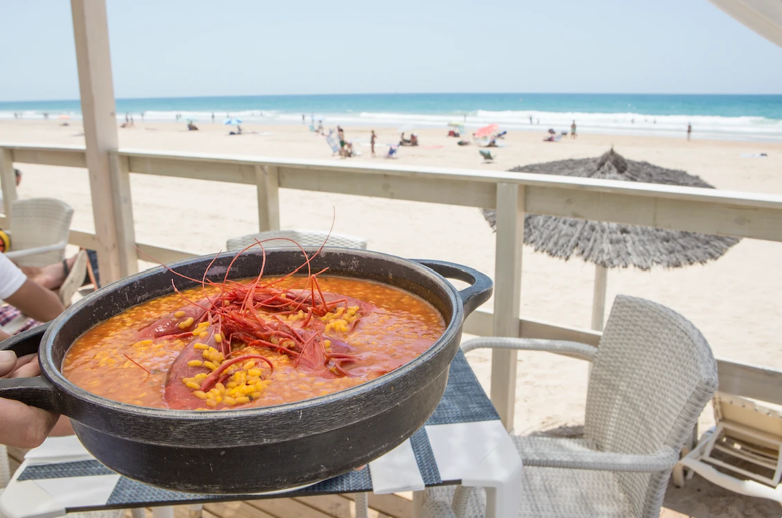Brothy rice with scarlet prawns