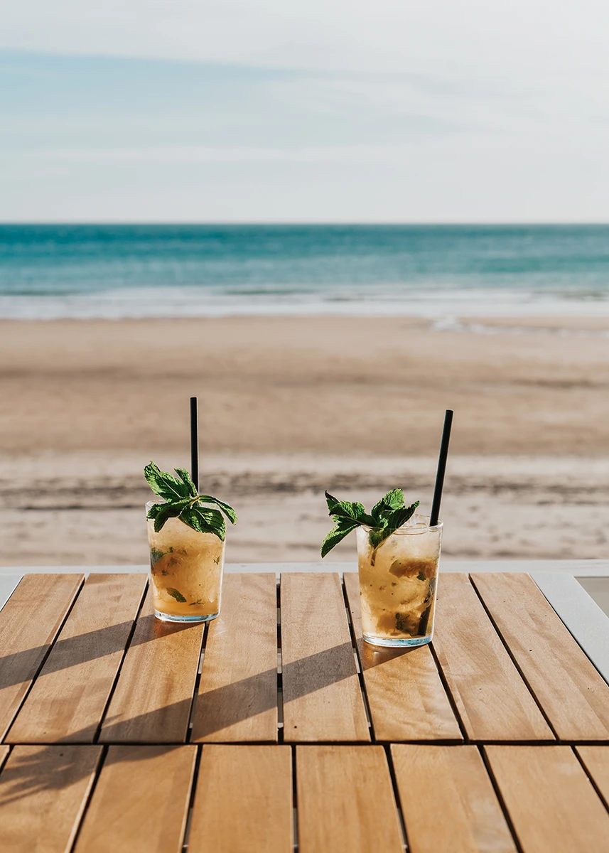 Cocktails with the sea in the background